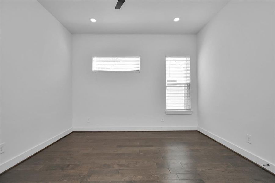 Enjoy the timeless elegance of hardwood flooring in your primary retreat, adding warmth and sophistication to the space