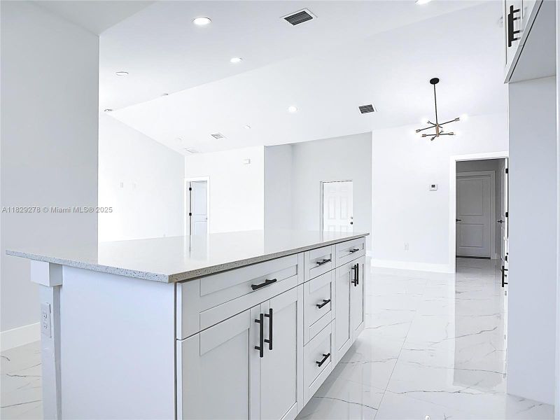 Furnished interior view inside a new home in , Lehigh Acres (Image 16).