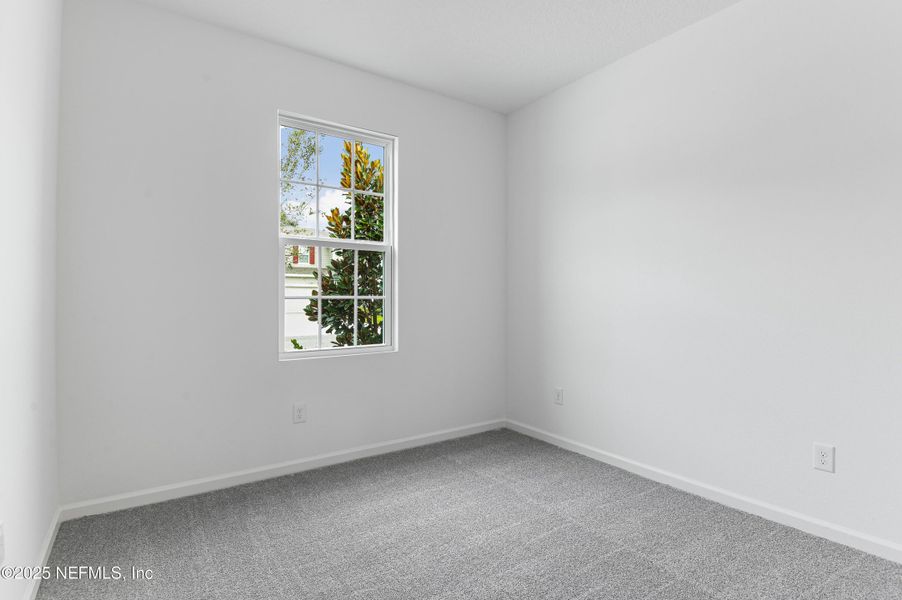 Spacious, unfurnished interior of a new home in Seasons at Grandview Gardens, Deland (Image 11).