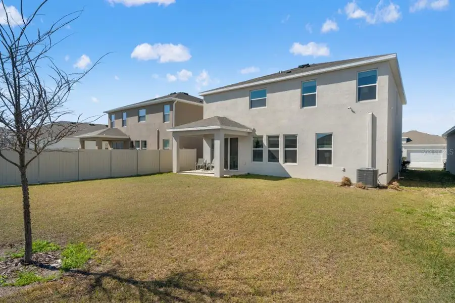 Exterior details and patio area of a home in , Wesley Chapel (Image 4).