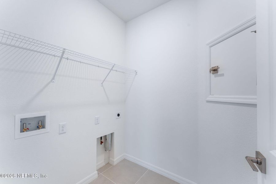 Spacious, unfurnished interior of a new home in Del Webb Wildlight, Yulee (Image 37).