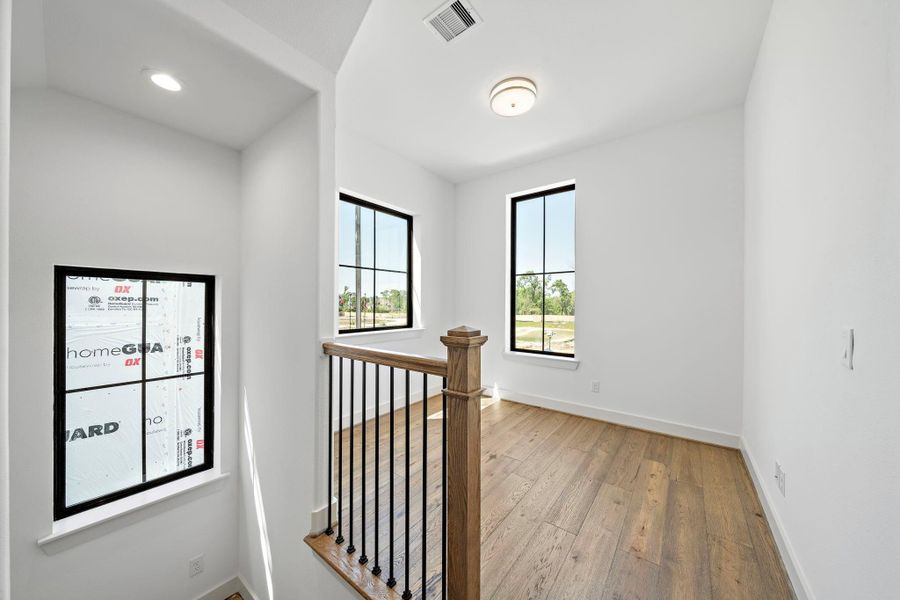 Spacious, unfurnished interior of a new home in Spring Valley Creek, Houston (Image 30).
