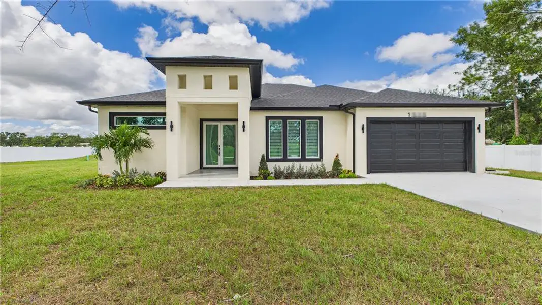 Front exterior of a new home in , Ruskin, FL, highlighting curb appeal (Image 2). Front exterior of a new home in , Ruskin, FL, highlighting curb appeal (Image 2).
