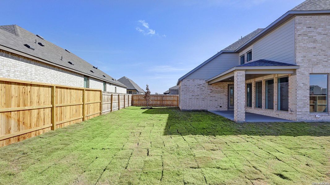 Exterior details and patio area of a home in Alsatian Oaks, Castroville (Image 3).