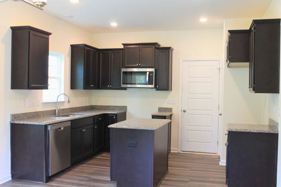 Furnished interior view inside a new home in The Wilcox, Greensboro (Image 5). Furnished interior view inside a new home in The Wilcox, Greensboro (Image 5).