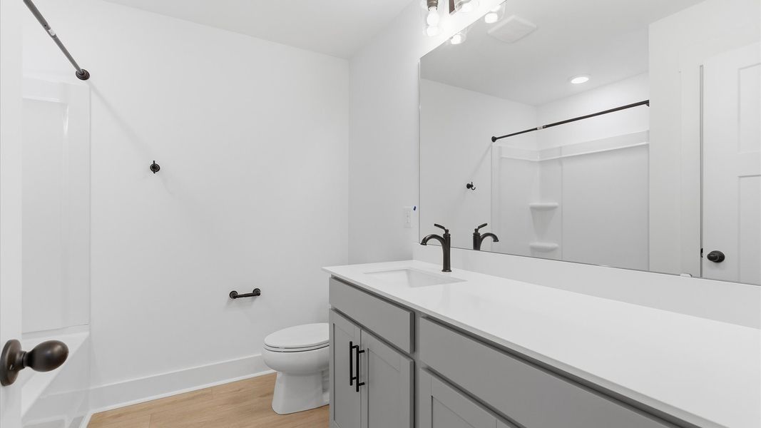 Furnished interior view inside a new home in Village at Midway, Anderson (Image 27).