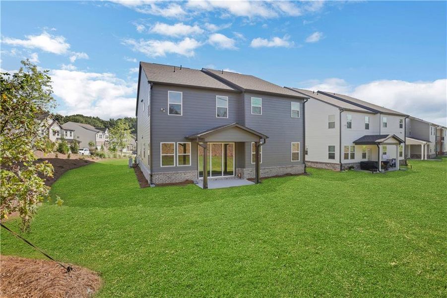 Exterior details and patio area of a home in The Paddocks at Doc Hughes, Buford (Image 28).