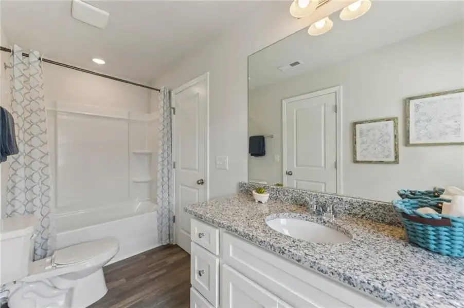 Furnished interior view inside a new home in The Hills at Cedar Creek, Winder (Image 55).