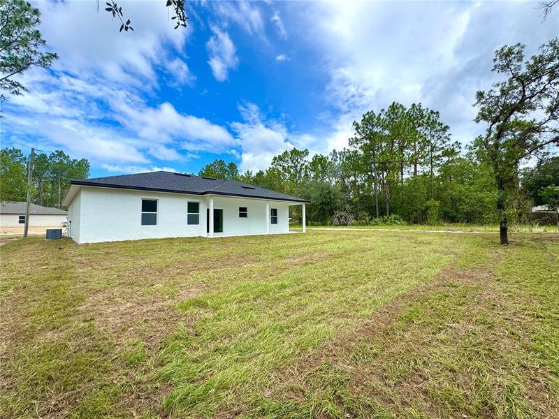 Front exterior of a new home in , Citrus Springs, FL, highlighting curb appeal (Image 21). Front exterior of a new home in , Citrus Springs, FL, highlighting curb appeal (Image 21).