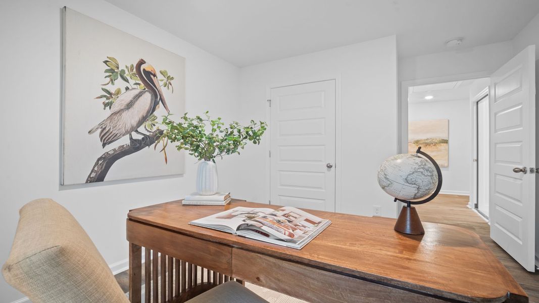Representative furnished interior of a home built from the Freeport by D.R. Horton in Palm Ridge, Guyton (Image 24).