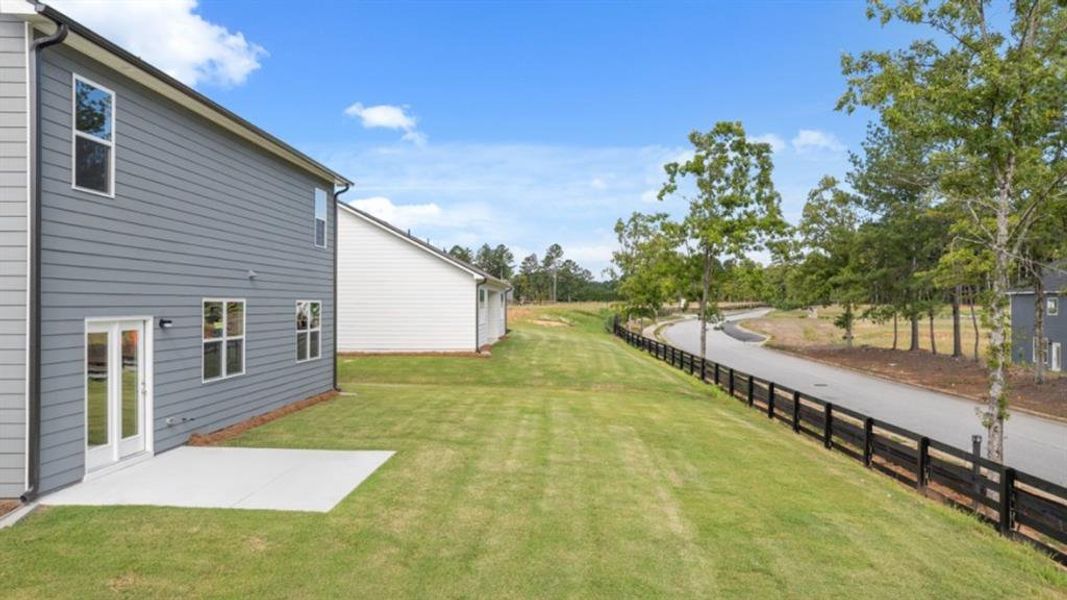 Exterior details and patio area of a home in Fairway 17 at Mirror Lake, Villa Rica (Image 23). Exterior details and patio area of a home in Fairway 17 at Mirror Lake, Villa Rica (Image 23).