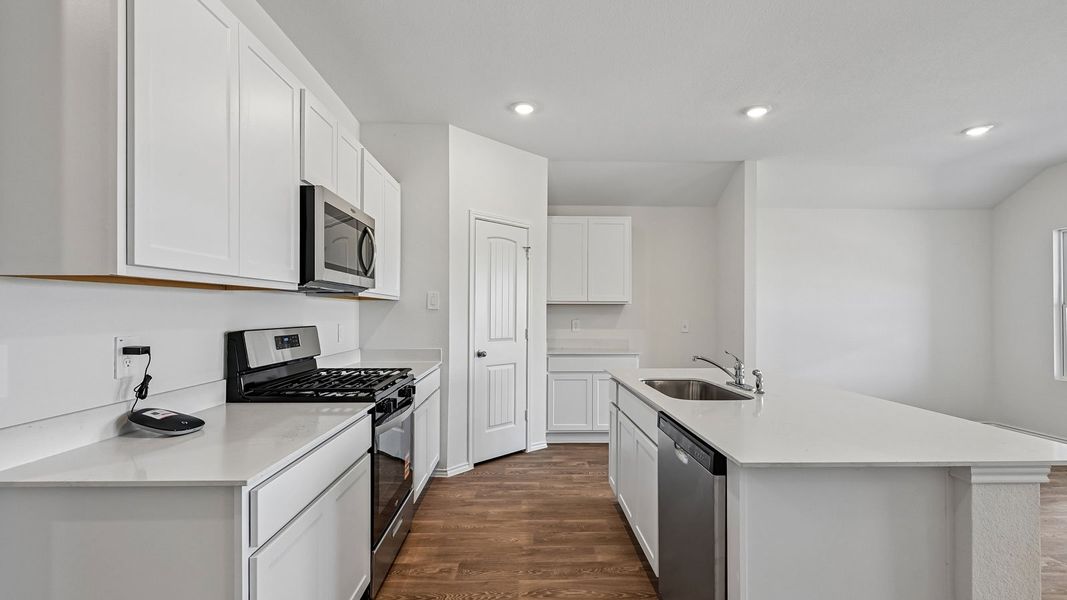Furnished interior view inside a new home in Watermill, Uhland (Image 6).