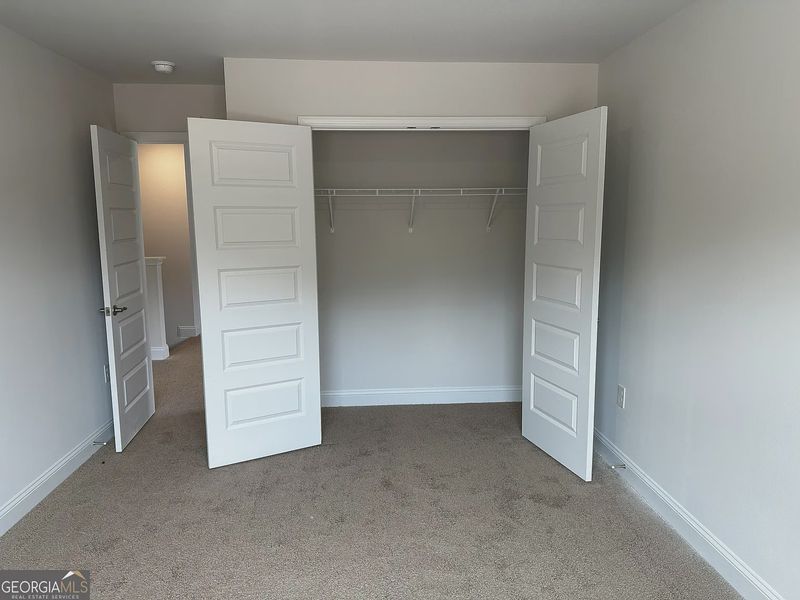 Spacious, unfurnished interior of a new home in Canterbury Villas, Carrollton (Image 10).