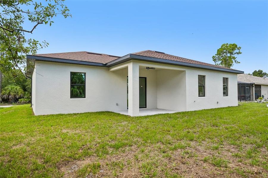 Exterior details and patio area of a home in , North Port (Image 19).