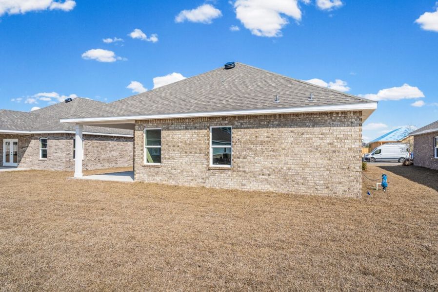 Exterior details and patio area of a home in Natureview, Freeport (Image 19).