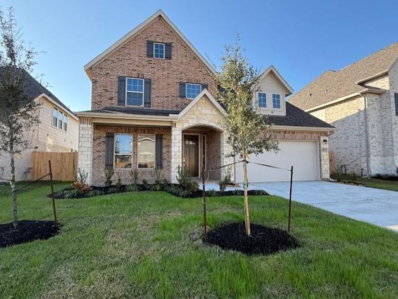 Two-story home with 4 bedrooms, 3.5 baths and 2 car garage