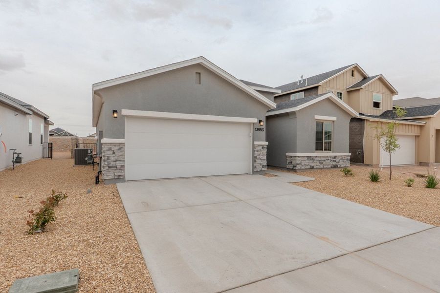 Front exterior of a new home in Summer Sky North, El Paso, TX, highlighting curb appeal (Image 20).