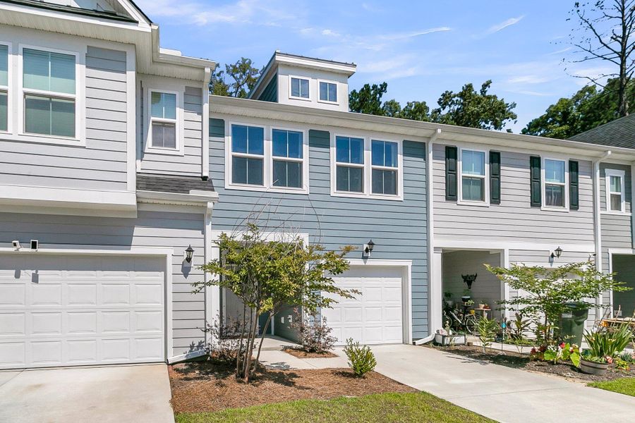 Front exterior of a new home in Boykins Run Townhomes, Moncks Corner, SC, highlighting curb appeal (Image 25). Front exterior of a new home in Boykins Run Townhomes, Moncks Corner, SC, highlighting curb appeal (Image 25).