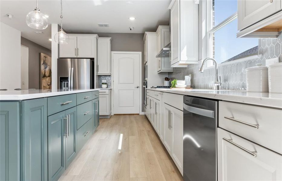 *Model Representation - Abundant cabinet space in kitchen