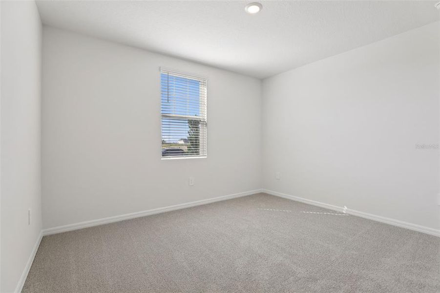 Spacious, unfurnished interior of a new home in Bradbury Creek - Signature Series, Haines City (Image 20).