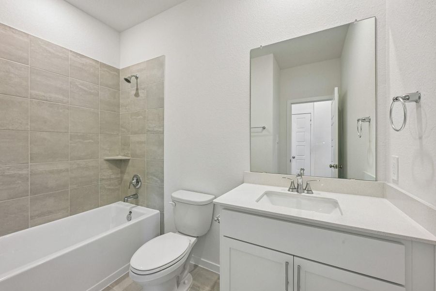 Furnished interior view inside a new home in Riviera Pines - Traditional Series, Huffman (Image 8).