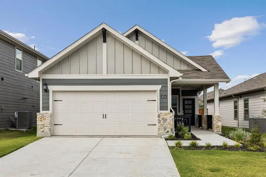Front exterior of a new home in Lakehaven - Spring Series, Farmersville, TX, highlighting curb appeal (Image 2). Front exterior of a new home in Lakehaven - Spring Series, Farmersville, TX, highlighting curb appeal (Image 2).
