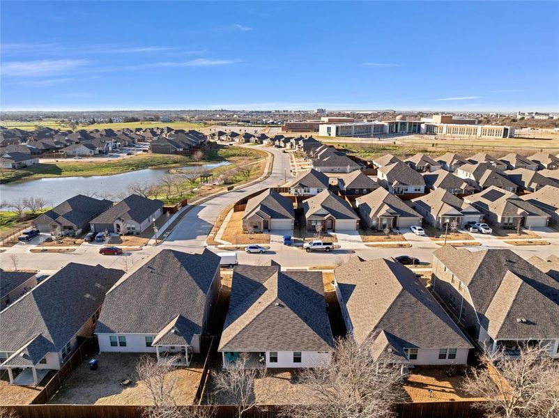 Drone / aerial view featuring a residential view and a water view