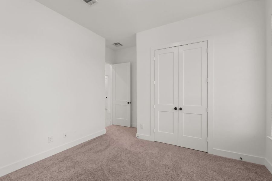 Representative unfurnished interior of a home built from the Palmer by Chesmar Homes in Riceland Alley Loads, Mont Belvieu (Image 31).