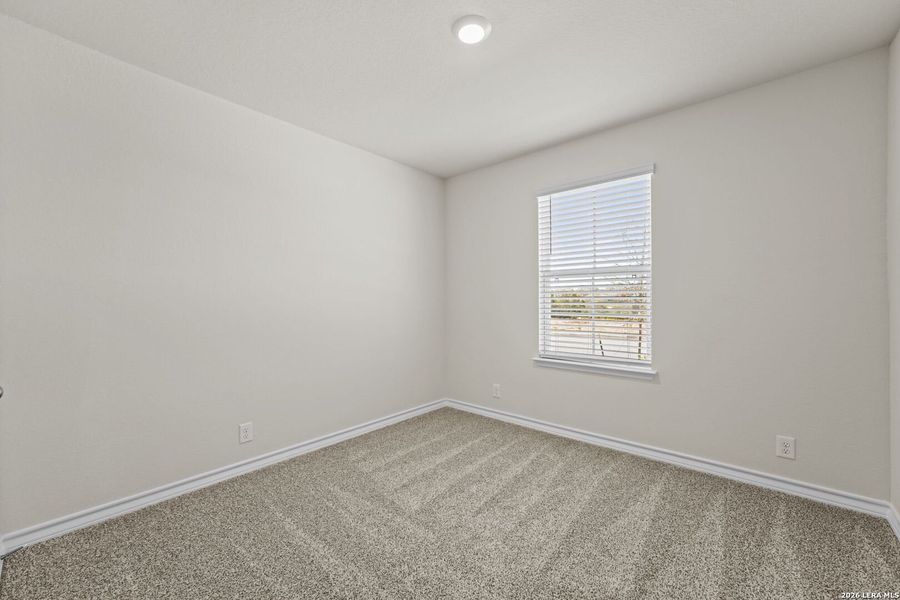 Spacious, unfurnished interior of a new home in Brookstone Creek, San Antonio (Image 26).