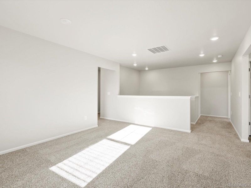 Spacious, unfurnished interior of a new home in Poudre Heights: The Lakes Collection, Windsor (Image 19).