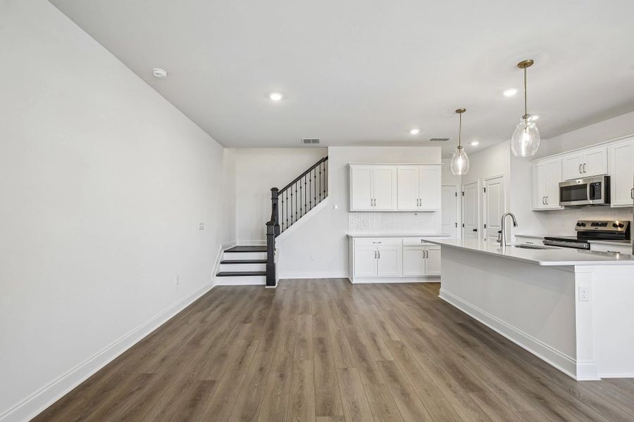 Dining Area & Hardwood Stairs