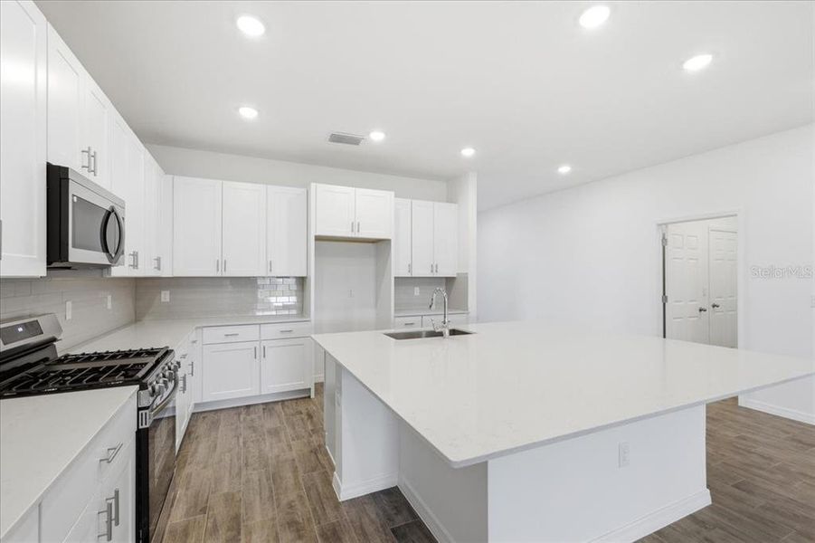 Furnished interior view inside a new home in Highfield at Twisted Oaks, Wildwood (Image 5).