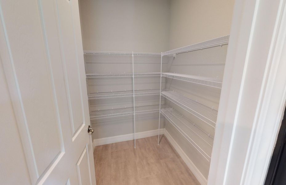 Representative unfurnished interior of a home built from the Palmary by Del Webb in Del Webb Sunbridge, St. Cloud (Image 21).