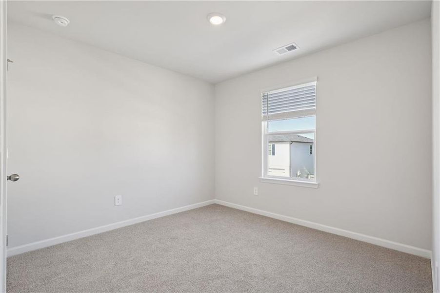 Spacious, unfurnished interior of a new home in Hawthorne Station, College Park (Image 39).