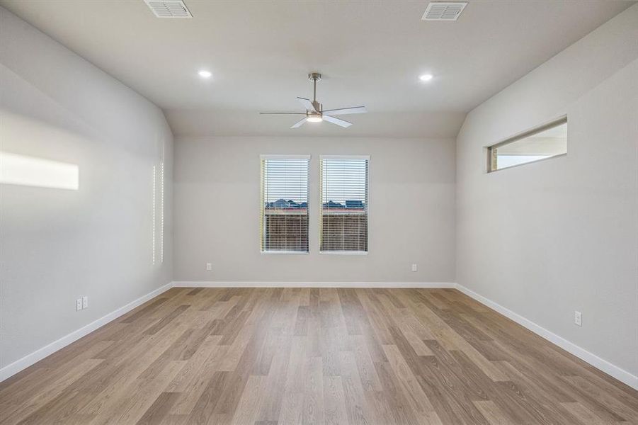 Living Room in the Wimbledon home plan by Trophy Signature Homes – REPRESENTATIVE PHOTO