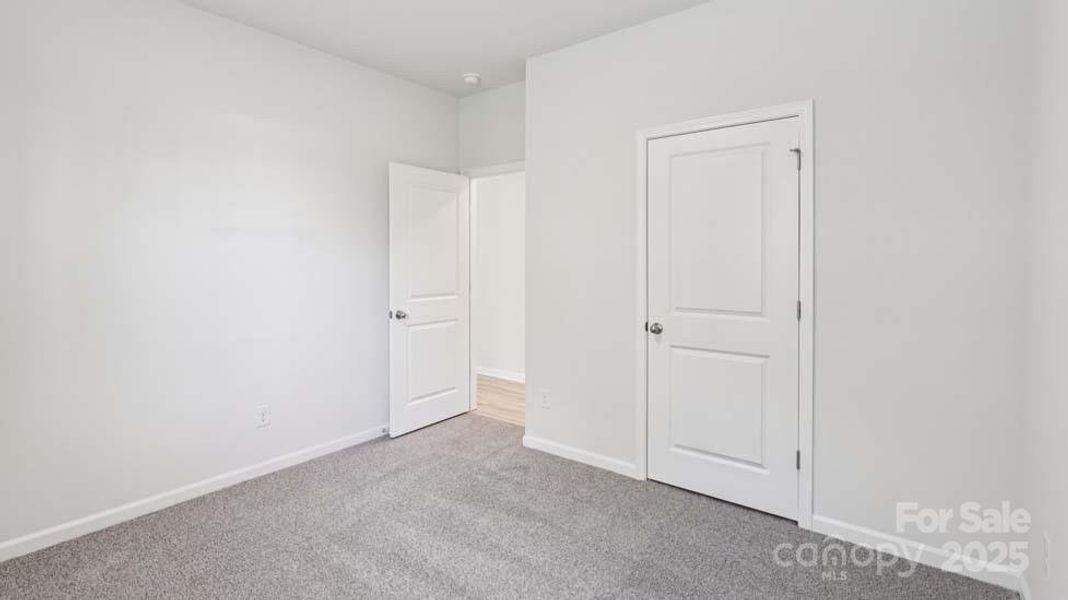 Spacious, unfurnished interior of a new home in Wallace Springs, Statesville (Image 23).