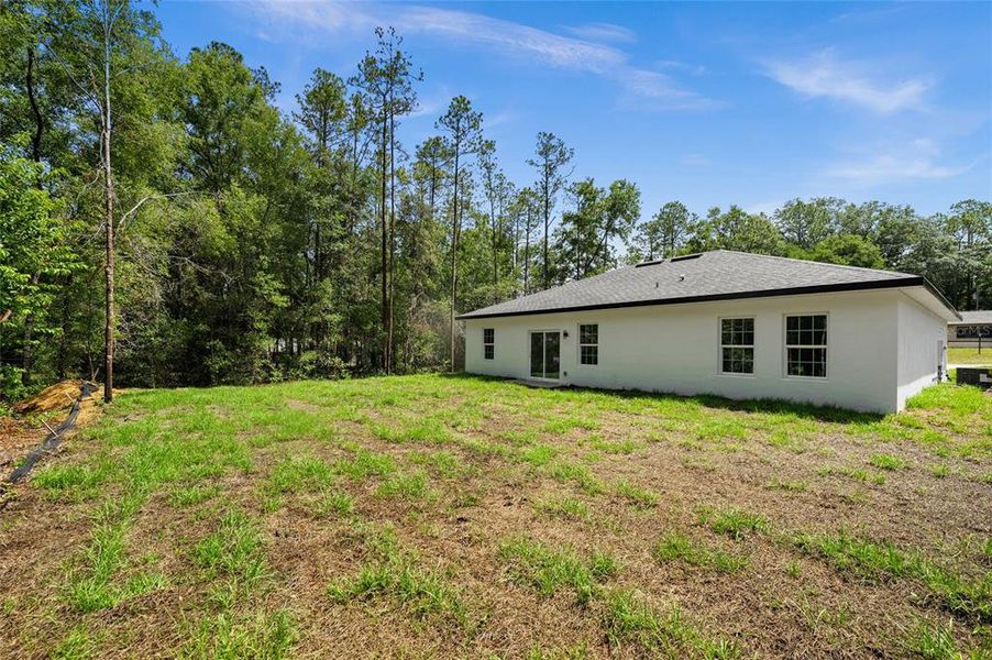 Exterior details and patio area of a home in , Citrus Springs (Image 4).