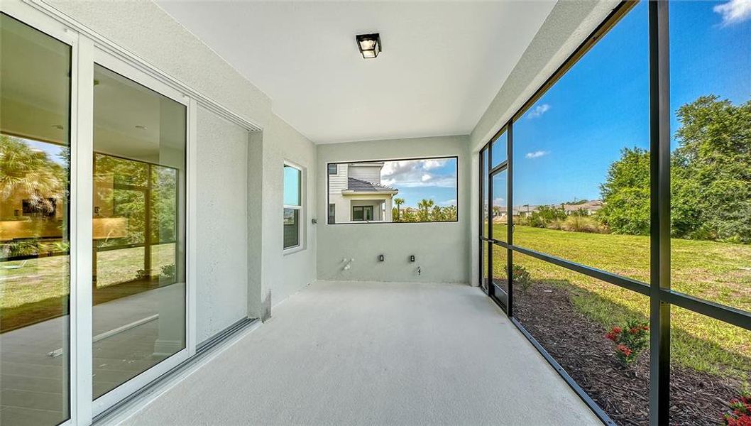 Exterior details and patio area of a home in Grand Park, Sarasota (Image 3).