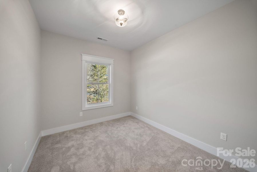 Spacious, unfurnished interior of a new home in , Asheville (Image 21).