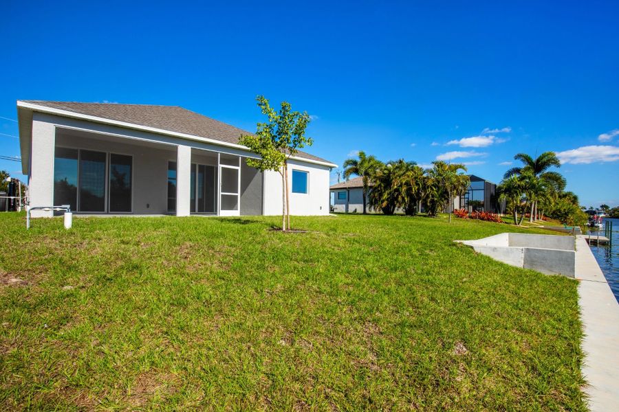 Exterior details and patio area of a home in Cape Coral, Cape Coral (Image 4).
