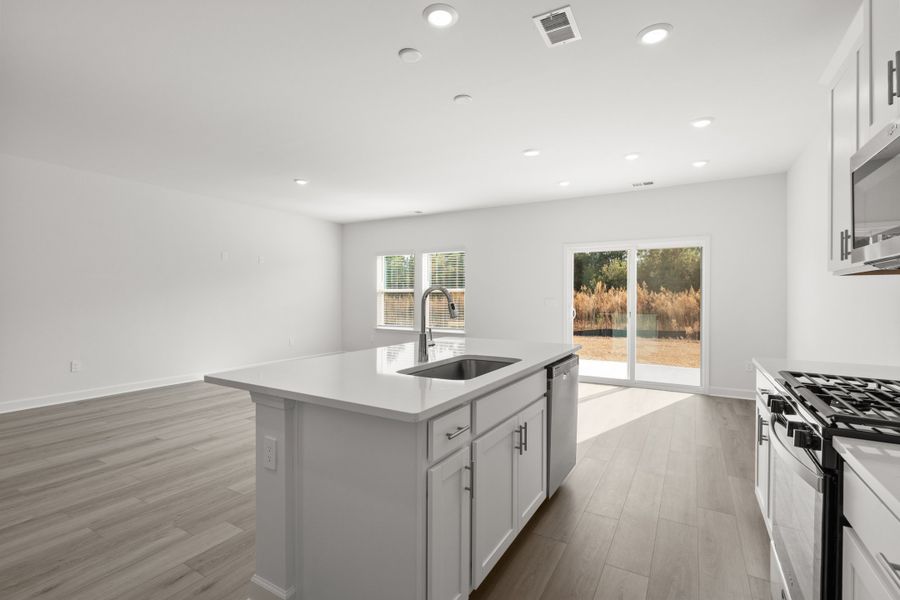 Furnished interior view inside a new home in Cypress Ridge - The Boardwalk Series, Longs (Image 10).