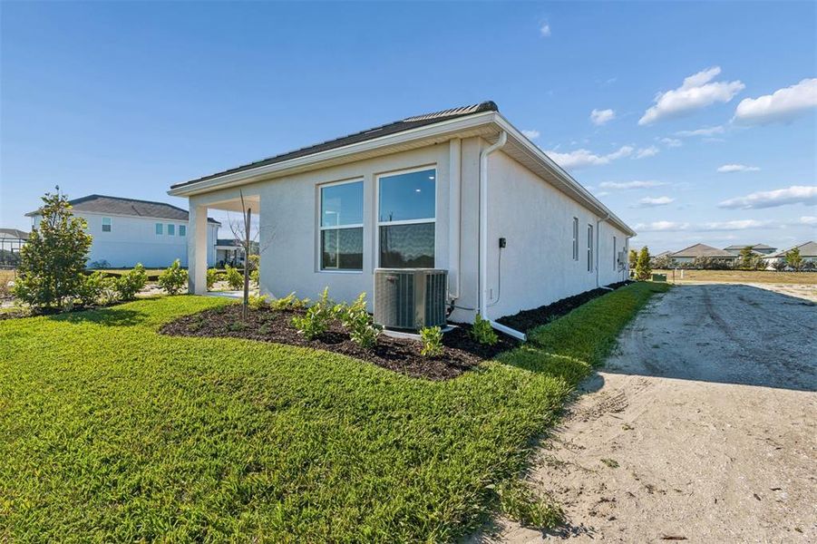 Exterior details and patio area of a home in Vistera of Venice – Garden Series, Nokomis (Image 22).