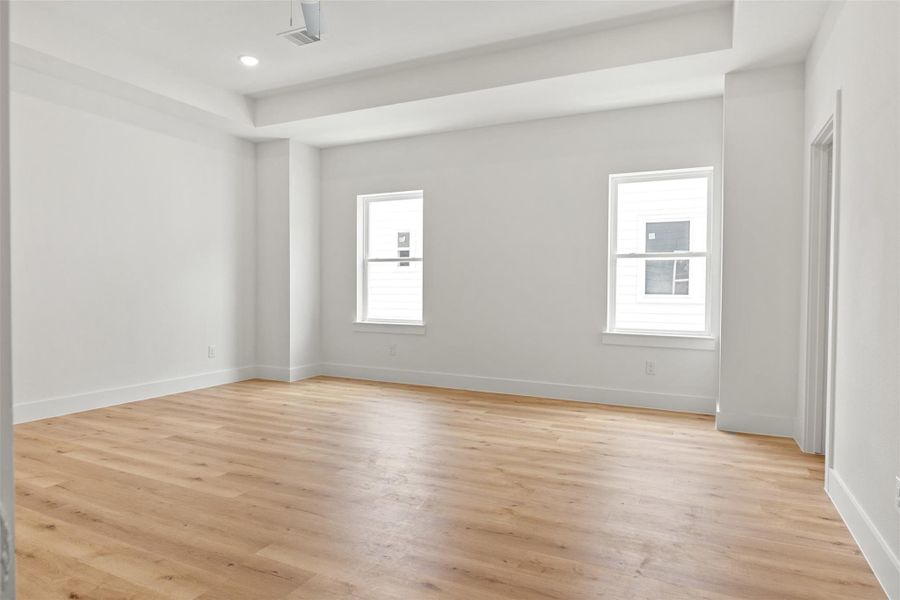 Enjoy the impressive scale of the living area, elevated by soaring 11-foot ceilings that enhance the sense of space and light.