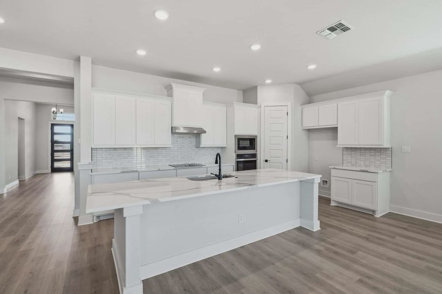 Representative furnished interior of a home built from the Mackenzie by Chesmar Homes in Sienna Lakes, San Antonio (Image 3). Representative furnished interior of a home built from the Mackenzie by Chesmar Homes in Sienna Lakes, San Antonio (Image 3).