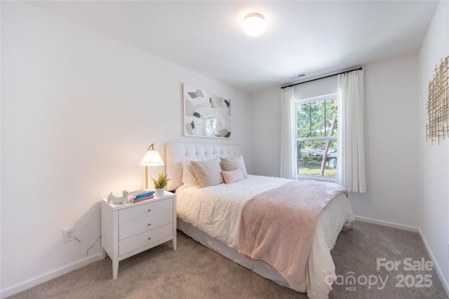 Furnished interior in a model home at Dukes Ridge in Charlotte (Image 5).