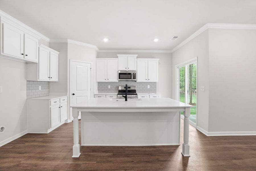 Representative furnished interior of a home built from the Magnolia Select M by McGuinn Homes in Broadway Lake, Anderson (Image 10).
