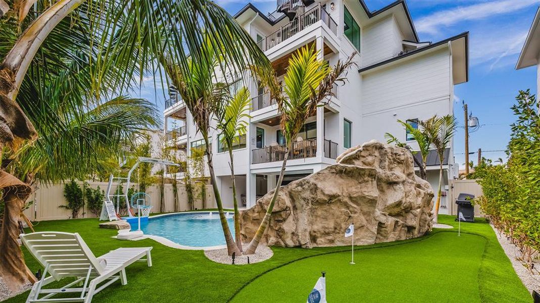 Exterior details and patio area of a home in , Sarasota (Image 37).