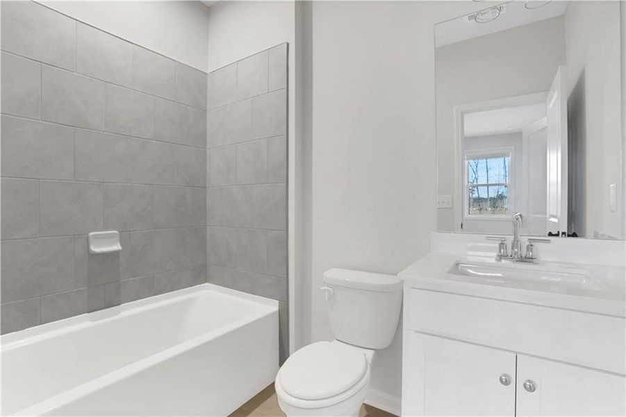 Furnished interior view inside a new home in Towne Village at Suwanee Dam, Sugar Hill (Image 11). Furnished interior view inside a new home in Towne Village at Suwanee Dam, Sugar Hill (Image 11).