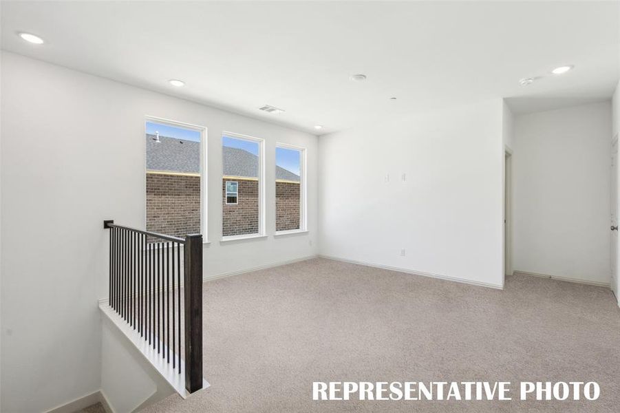 Light, bright and airy, this game room is the perfect place for family entertainment.  REPRESENTATIVE PHOTO