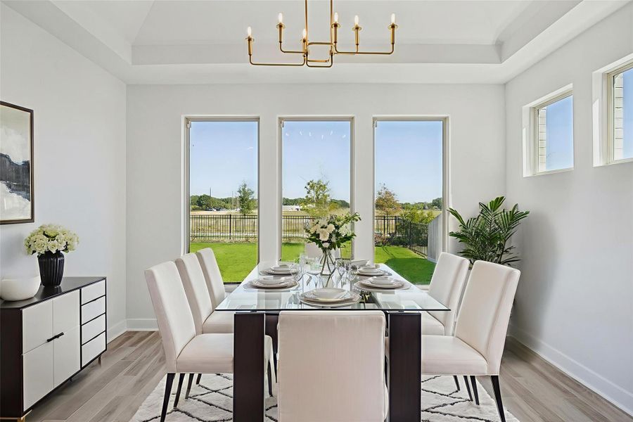 The dining room virtually staged so you can imagine the possibilities. The dining room virtually staged so you can imagine the possibilities.